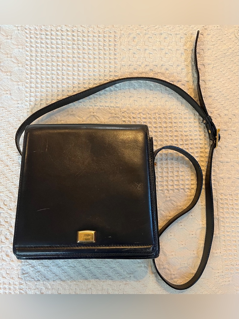Vintage Bally Black Leather Crossbody Bag with Flap Closure and Adjustable Strap